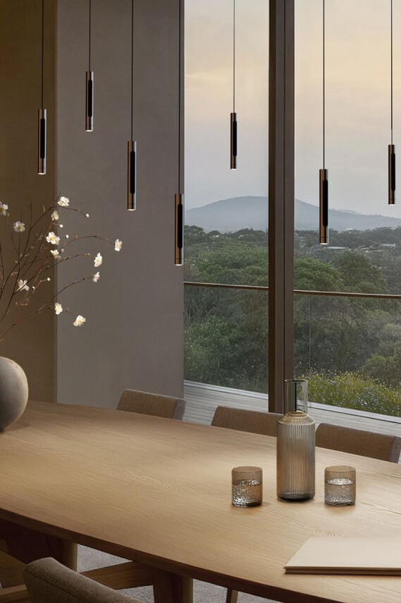 Occhio Pendelleuchten Coro über Tisch