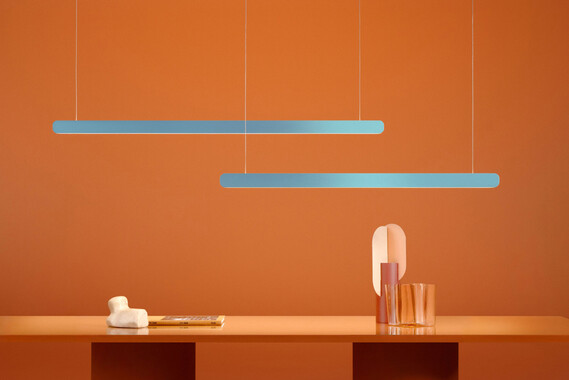 Occhio Mito volo pendant luminaire on orange backround