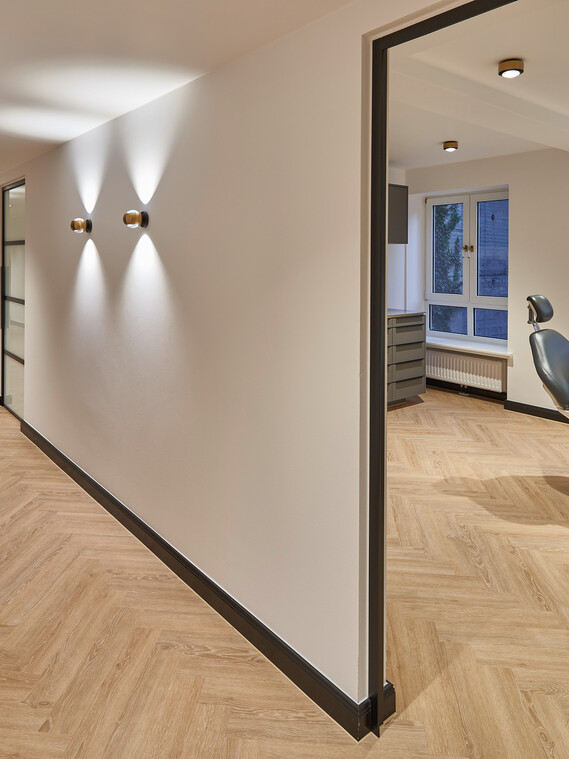 Praxisklinik Ulmenhof Behandlungsraum / Flur Piú alto v / io verticale